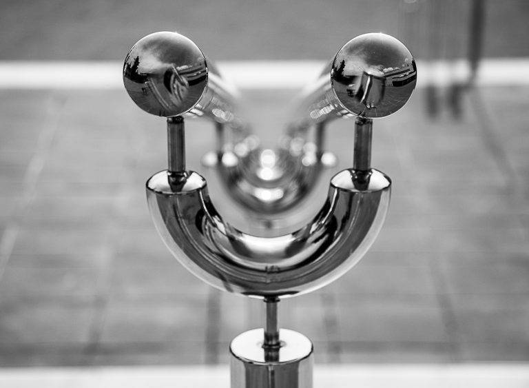 Chrome sculpture with two reflective spheres